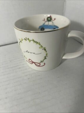 Parkhurst White Ceramic Mug with Green Wreath and Blue Car Accent
